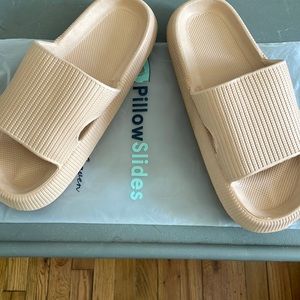 Pillow Slides. Brand new, never worn. Size 8. Too small for me.